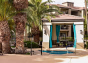 Thumbnail 25 of 26 - Shaded poolside ramada near spa and BBQ grill area