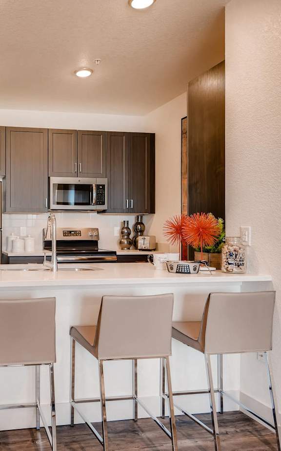 Kitchen with Island and Chairs at Auburn Brook, Castle Rock, CO, 80109