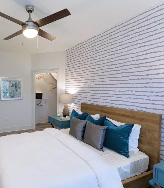 Satori Olathe Apartments in Kansas Model Bedroom with Attached Walk-In Closet