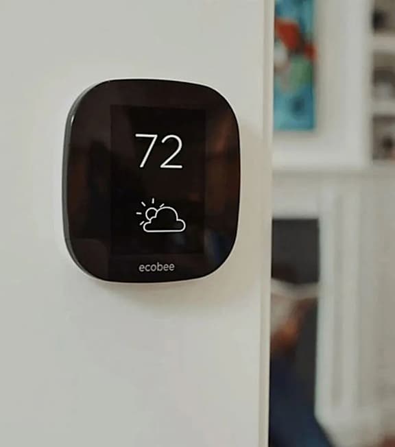 A wall-mounted thermostat at Sylk Towers, Ontario, N2A 1B1