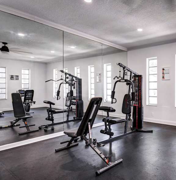 Fully equipped fitness center with free weights at Coronado Springs Apartments