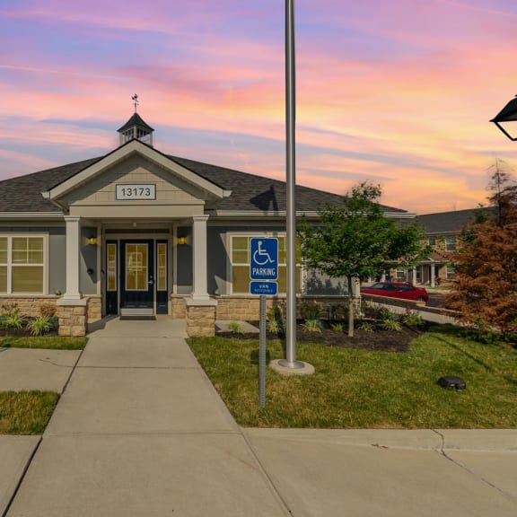 a home with a handicap sign in front of it