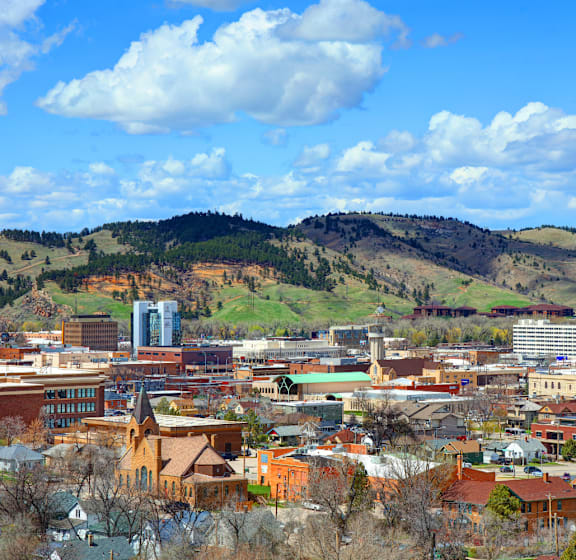 a city with a mountain in the background