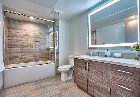 a bathroom with a toilet sink and bathtub