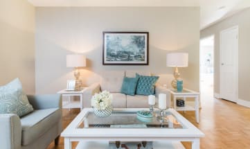 a living room with a couch and a coffee table