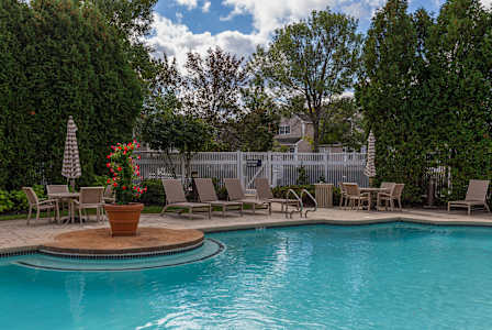 resort-style pool with spacious sundeck and available Wi-Fi