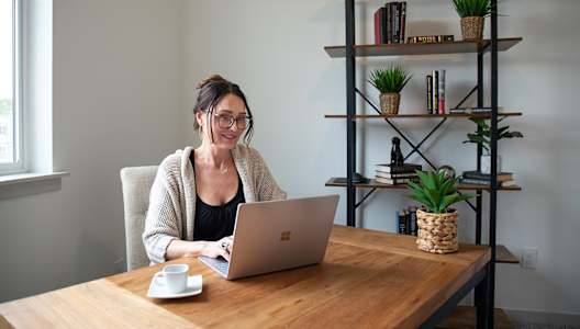 A woman working from a home office