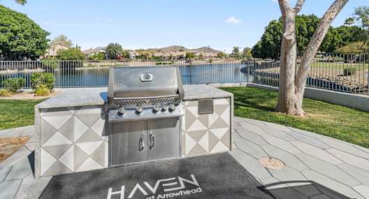 A modern outdoor grill with the brand name HAVEN of Atwater.