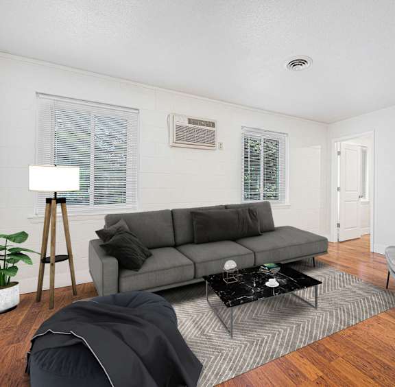 a living room with a couch and a chair