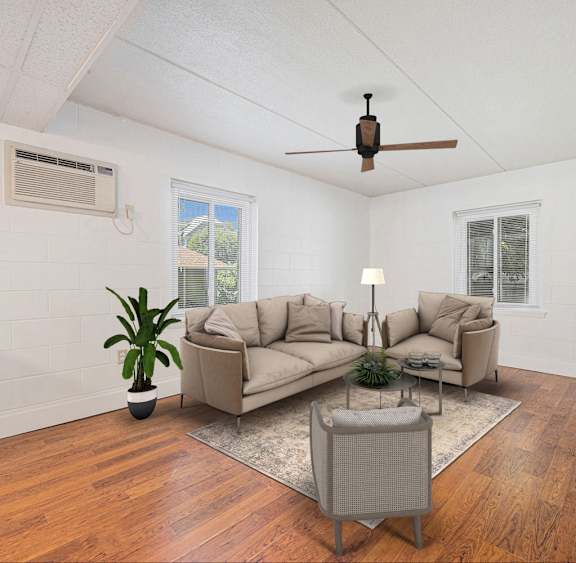 a living room with a couch and a ceiling fan