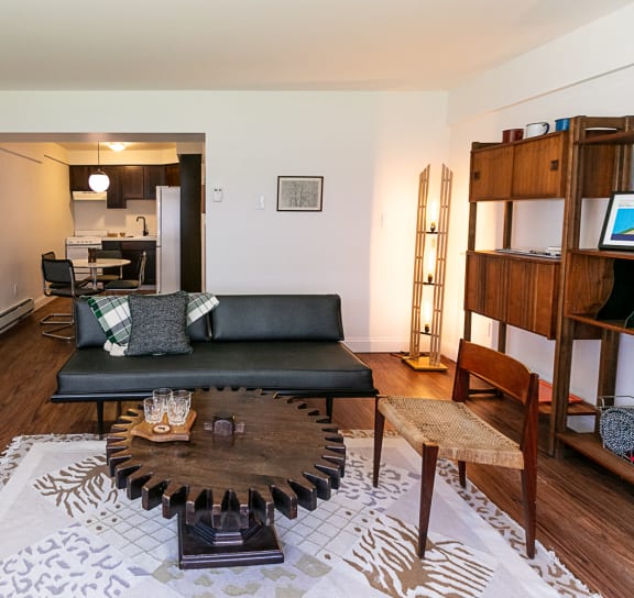 a bedroom with a bed and a door to a bathroom
