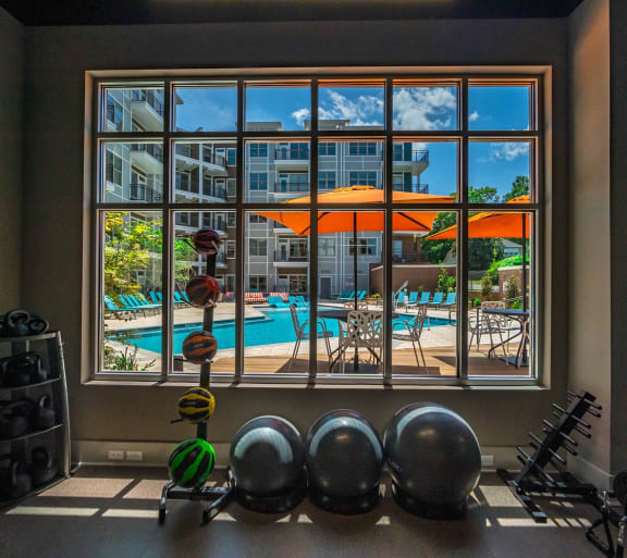 a view of the pool from the exercise room