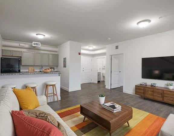 a living room with a couch and a television