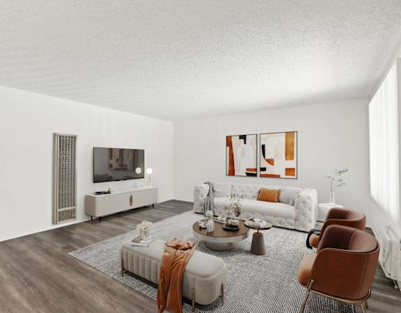a living room with a couch and a table and a television