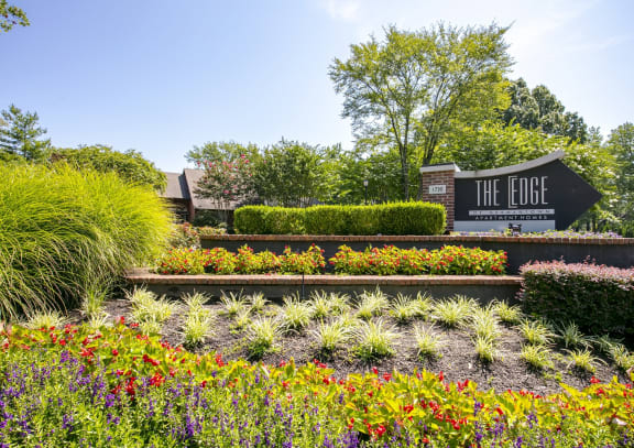 a view of the edge sign in front of a garden at The Edge of Germantown, Memphis, TN