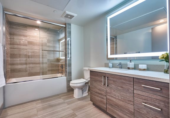 a bathroom with a toilet sink and bathtub