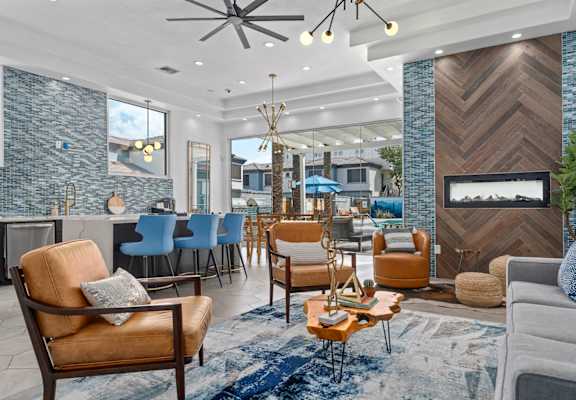 a living room filled with furniture and a fire place