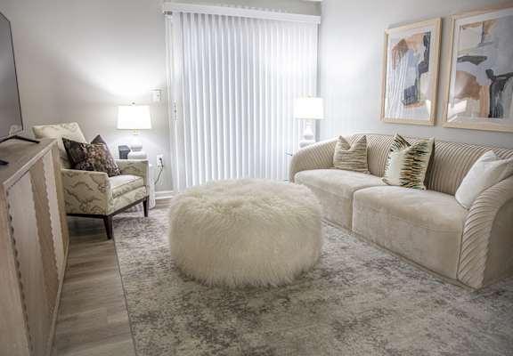 A living room at Evergreen Luxury Apartments, Merrillville, Indiana, 46410
