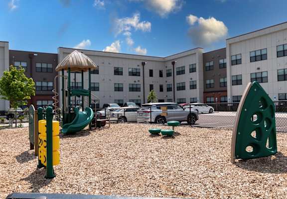 a playground in front of a building