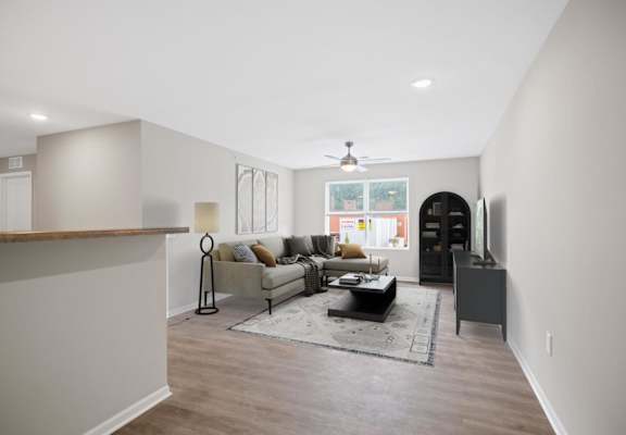 a living room with a couch and a table