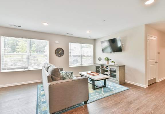 a living room with a couch and a coffee table