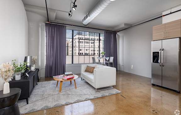 a kitchen and living room at Maxfield Lofts Apartments, California