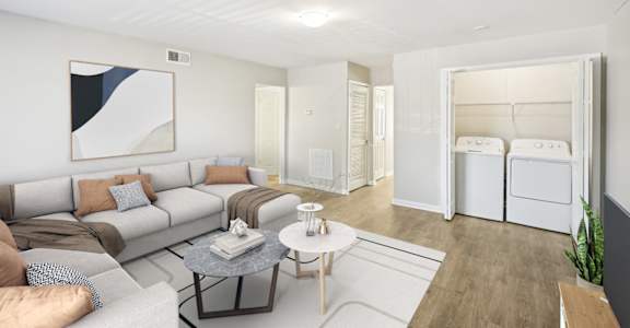 Spacious living room in affordable Marietta apartment with wood-style flooring and open layout