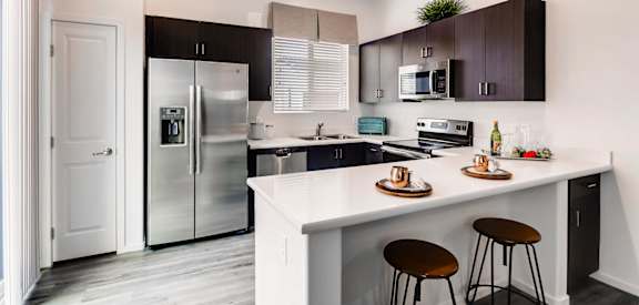 Gourmet Kitchen with Island at Avilla Lehi Crossing, Mesa, AZ 85213