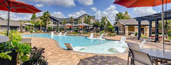 Pool seating and sun deck at Avenues at Shadow Creek Ranch, Pearland, TX, 77584