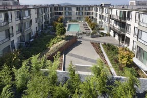 Common area with a swimming pool that can be enjoyed by our residents.