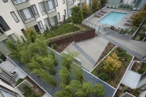 Common area with a swimming pool that can be enjoyed by our residents.