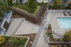 Common area with a swimming pool that can be enjoyed by our residents.
