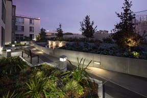Inner courtyard with a water feature and sitting area.