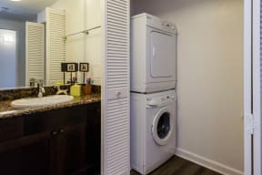 Lavatory area with washer/dryer closet