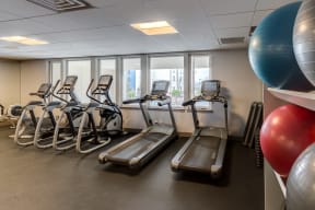 Treadmill and Stationary Bikes in our Fitness Center | 2828 Zuni