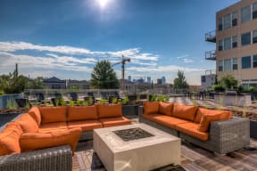 Outdoor Lounge Area with Fire Pit - 2828 Zuni Apartments