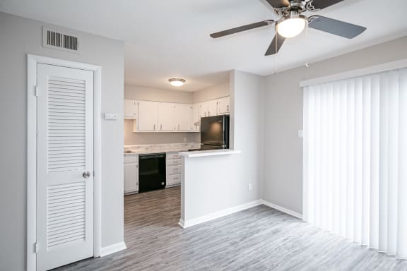Living Area with Kitchen View at Arbor Pointe at Hillcrest in Little Rock, AR