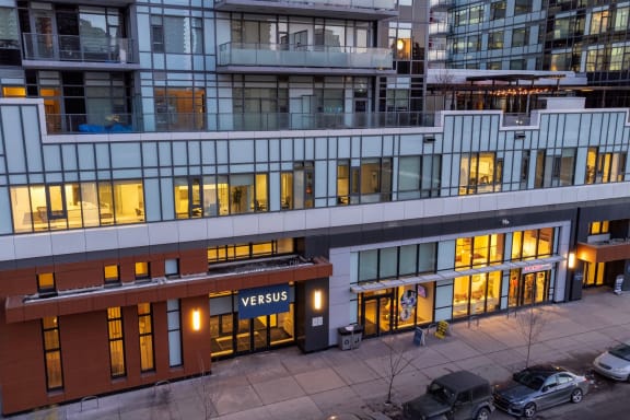 an overhead view of an office building with cars parked outside at Versus, Calgary, Alberta
