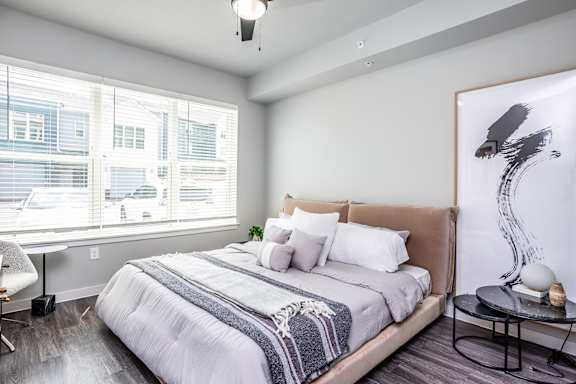 Spacious suites with hardwood-inspired flooring, 9-foot ceilings and designer light fixtures