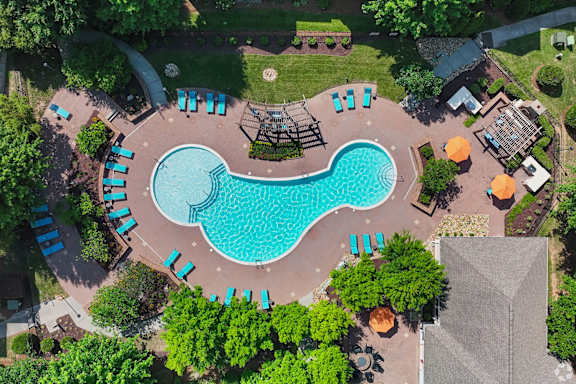 Saltwater pool with sundeck, fire pit, cabanas, WiFi, TV lounge and gas grills