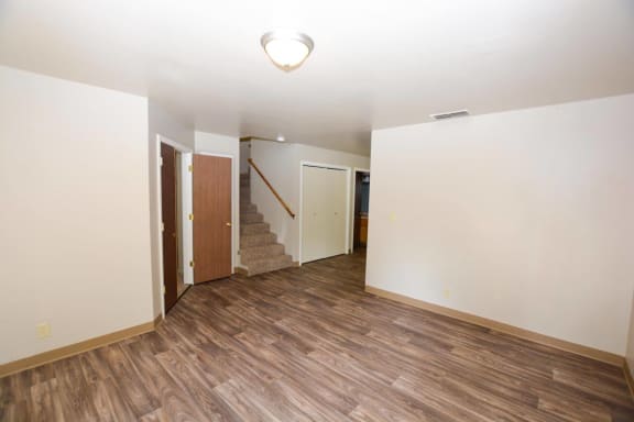 View of Hidden Oaks living room looking up stairs