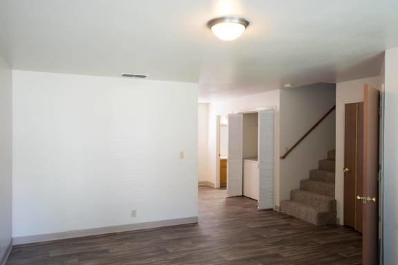 View of Hidden Oaks living room looking up stairs