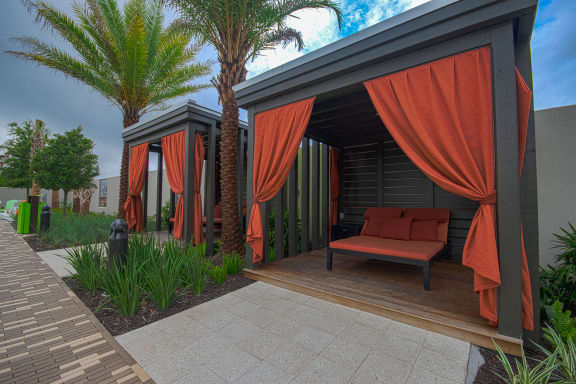 Poolside Cabanas at The Strand Apartments in Oviedo, FL