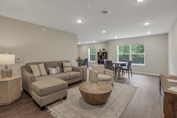 a living room with a couch and a table