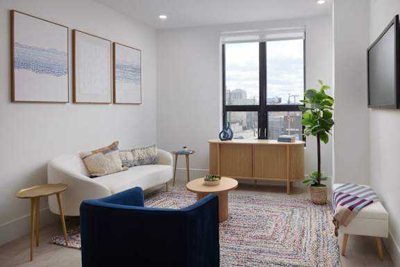Living Room With TV at 23 West, Philadelphia