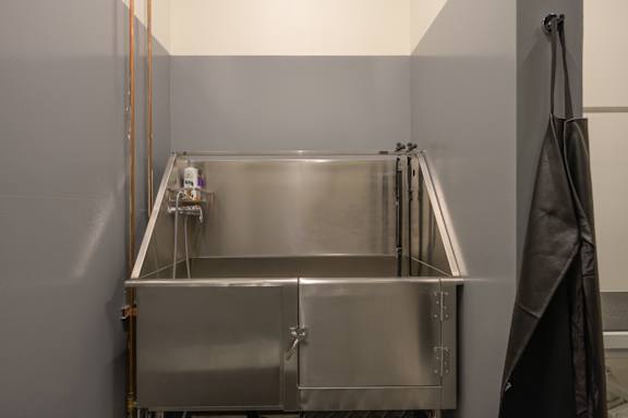 a stainless steel kitchen with a sink and a refrigerator at The Lucy Boise Apartments, Idaho, 83702