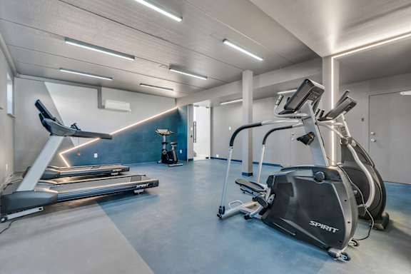 A gym with treadmills, elliptical machines, and other exercise equipment Townhomes at Gateway, Bensalem, Pennsylvania