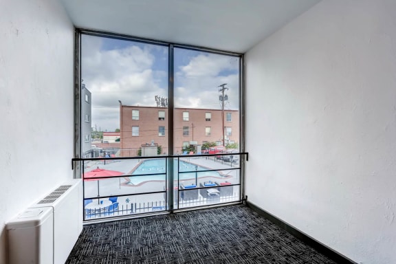 Hallway with View of Pool at Peak 54