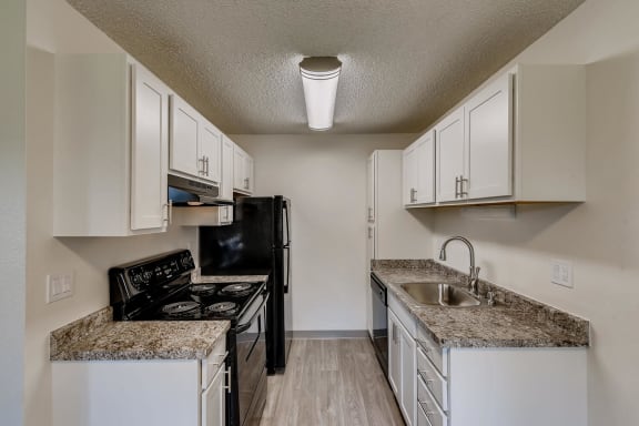 A Standard Kitchen at Morningtree Park Apartments