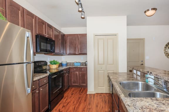 Kitchen at Riversong Apartment Homes, FL, 34205